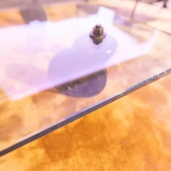 FontanaArte Couchtische|Couchtisch Tavola con Ruota Grande, Design Gea Aulenti 1980, geschliffenes Glas 15 mm, Gestell Rollen schwarz