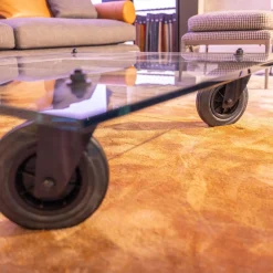 FontanaArte Couchtische|Couchtisch Tavola con Ruota Grande, Design Gea Aulenti 1980, geschliffenes Glas 15 mm, Gestell Rollen schwarz