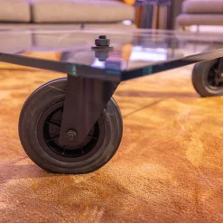 FontanaArte Couchtische|Couchtisch Tavola con Ruota Grande, Design Gea Aulenti 1980, geschliffenes Glas 15 mm, Gestell Rollen schwarz