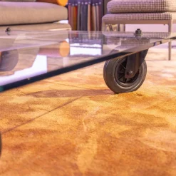 FontanaArte Couchtische|Couchtisch Tavola con Ruota Grande, Design Gea Aulenti 1980, geschliffenes Glas 15 mm, Gestell Rollen schwarz