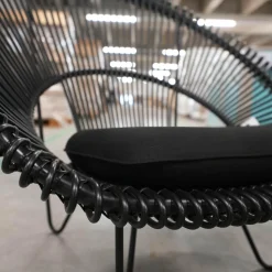 Vincent Sheppard Loungesessel|Loungesessel Roy Cocoon Outdoor Kissen Bezug Sunbrella Schwarz Geflecht Polyethylen Schwarz Untergestell Stahl Schwarz